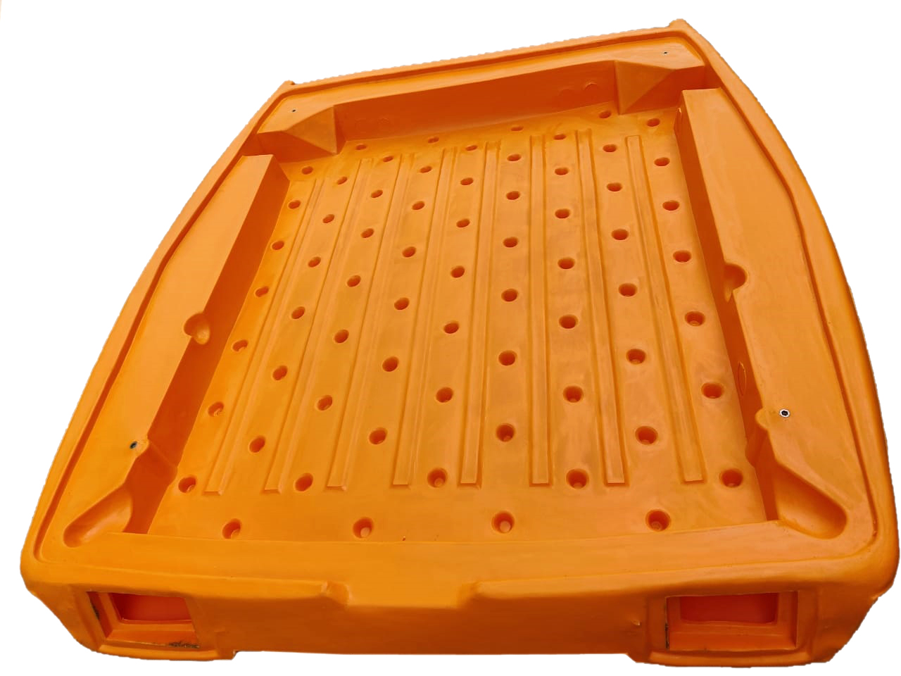 Orange rotomoulded perforated pallet and drainage tray, top view